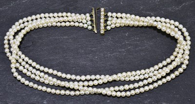 Lot 1326 - A cultured pearl four row choker set with...