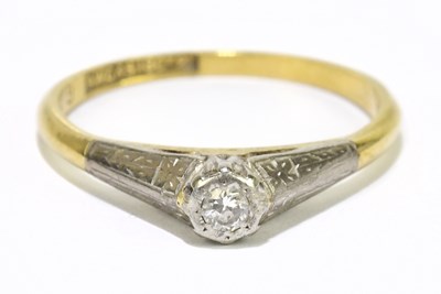 Lot 1199 - An 18ct yellow gold tiny diamond solitaire...