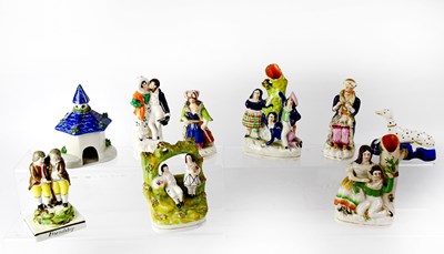 Lot 324 - Nine late 19th/early 20th century Staffordshire flatbacks and figures