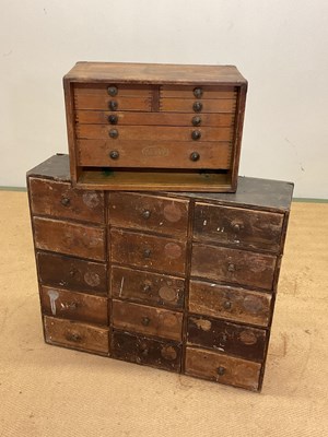 Lot 663 - Two banks of table top workshop drawers,...