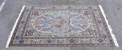 Lot 1473 - A fine hand knotted Persian style rug with...