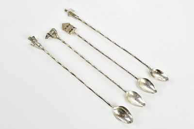 Lot 2142 - A pair of Eastern sterling silver long spoons...