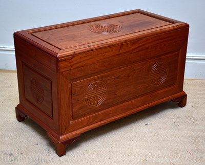 Lot 1058 - A Chinese rosewood blanket chest with carved...