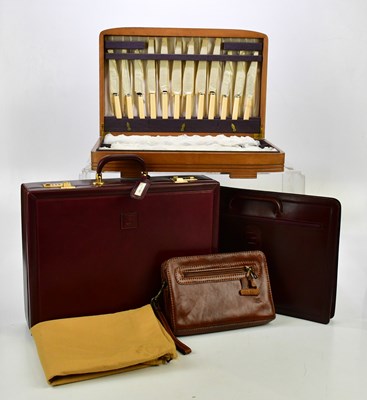 Lot 1677 - GILBARTO; a vintage travelling suitcase,...