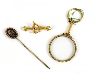 Lot 390 - A 9ct yellow gold wishbone brooch, length...