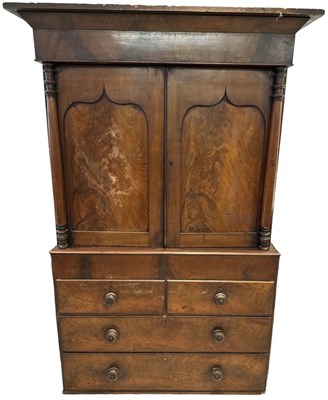 Lot 22 - A large 19th century mahogany linen press,...