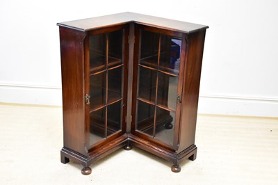 Lot 1384 - A 19th century oak freestanding corner cabinet...