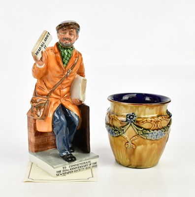 Lot 2459 - ROYAL DOULTON; 'The Newsvendor', HN2891,...