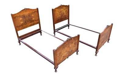 Lot 1339 - A pair of walnut single beds, height 132cm,...