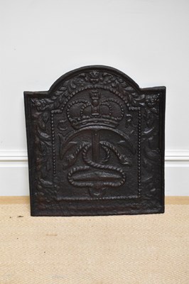 Lot 1719 - A Charles I cast iron fire back, relief...