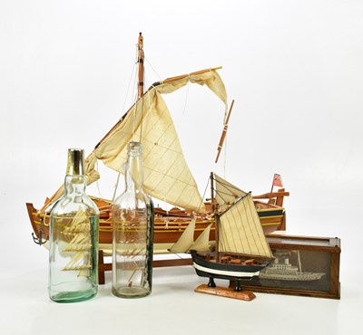 Lot 1582 - A vintage wooden model boat on stand, length...