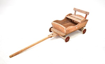 Lot 890 - A vintage pine pull-along go cart, 74 x 35cm.
