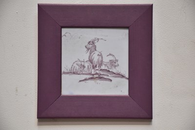 Lot 2487 - A framed Delft tile painted with goats, 12 x...