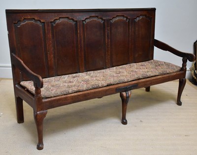 Lot 1344 - An 18th century oak five panel settle, height...