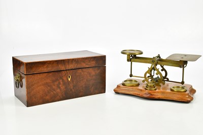 Lot 1583 - A 19th century inlaid mahogany tea caddy of...