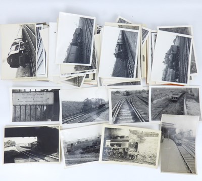 Lot 586 - A quantity of vintage photographs of steam trains