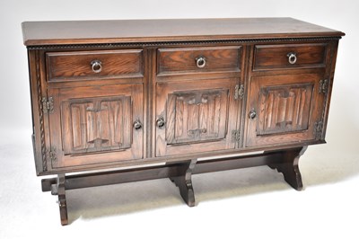 Lot 30 - An early 20th century dark stained oak side...