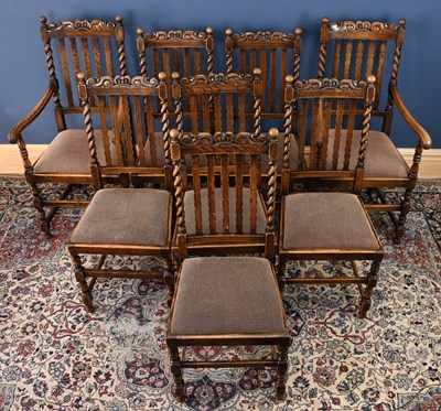 Lot 3079 - A set of eight 1920s carved oak Carolean style...