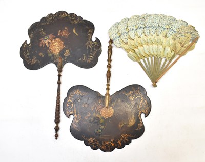Lot 429 - Two 19th century face screens or fixed fans,...