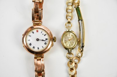 Lot 617 - A vintage 9ct rose gold wristwatch with white...