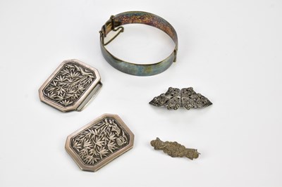 Lot 507 - A sterling silver snap bangle with chased...