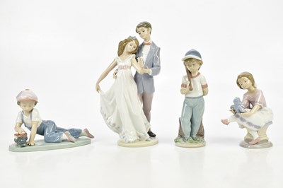 Lot 2522 - LLADRO; a group of four figures comprising...