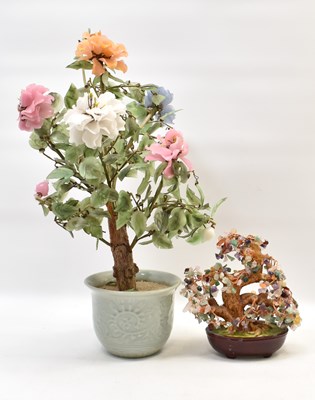 Lot 157 - An Oriental carved hardstone and wood-effect...