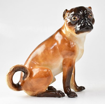 Lot 194 - MEISSEN; a porcelain model of a seated brown...