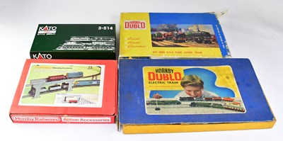 Lot 623 - Four boxed OO gauge railway sets comprising...