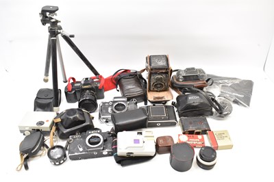 Lot 592 - Various vintage cameras and equipment to...
