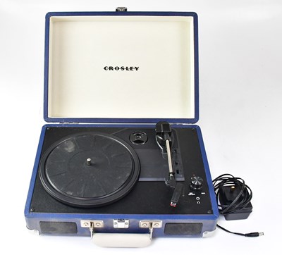 Lot 581 - CROSLEY; a leatherette cased portable...