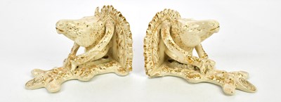 Lot 2489 - A pair of horsehead porcelain wall brackets,...