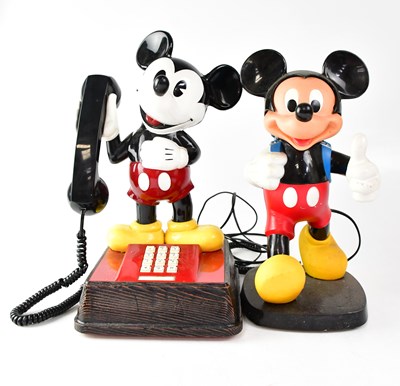 Lot 673 - Two Mickey Mouse telephones, one with push...