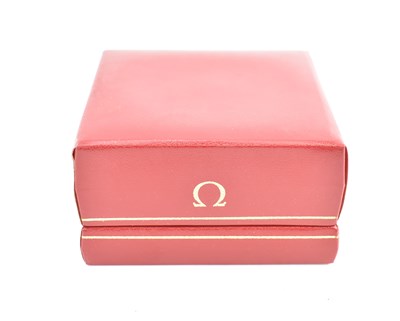 Lot 1182 - An empty red Omega watch box.
