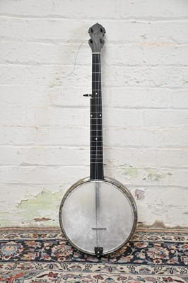 Lot 2902 - W TEMLETT; a five string banjo, with carved...