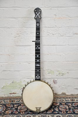 Lot 1546 - A five string banjo, with mahogany neck, burr...