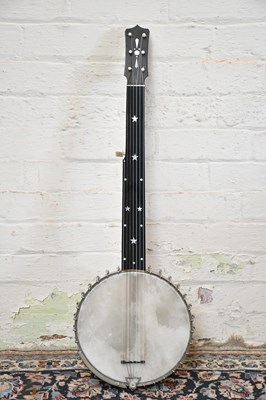 Lot 2901 - A fretless seven string banjo with mother of...