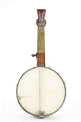Lot 1552 - A five string fretted banjo, with brass...