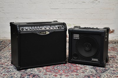 Lot 1580 - ROLAND; a Cube 30 bass amplifier together with...