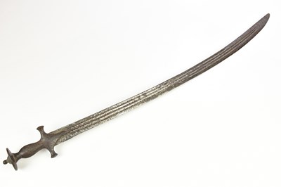 Lot 1357 - An Indian Talwar, with 85cm curved blade, iron...