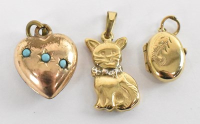 Lot 1383 - A 9ct yellow gold pendant modelled as a cat,...