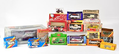 Lot 874 - A collection of boxed diecast model vehicles...
