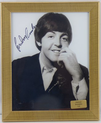 Lot 545 - SIR PAUL MCCARTNEY; a photograph of a young...