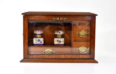 Lot 408 - A late 19th/early 20th century oak cased desk...