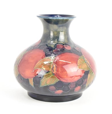 Lot 304 - WILLIAM MOORCROFT; a 'Pomegranate and Berry'...