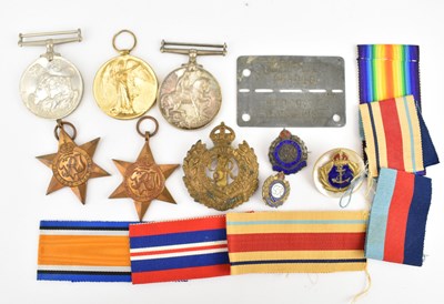 Lot 498 - A group of mixed medals comprising a WWI War...