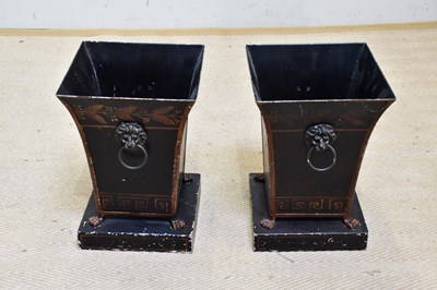 Lot 1457 - A pair of modern black painted metal planters,...