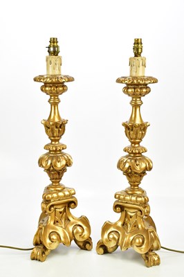 Lot 1814 - A pair of modern ornate gilt painted table...