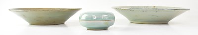 Lot 491 - Two Chinese Provincial celadon glazed shallow...
