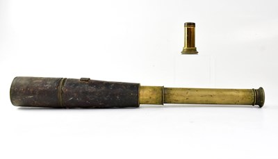 Lot 465 - A three-draw leather covered brass telescope,...